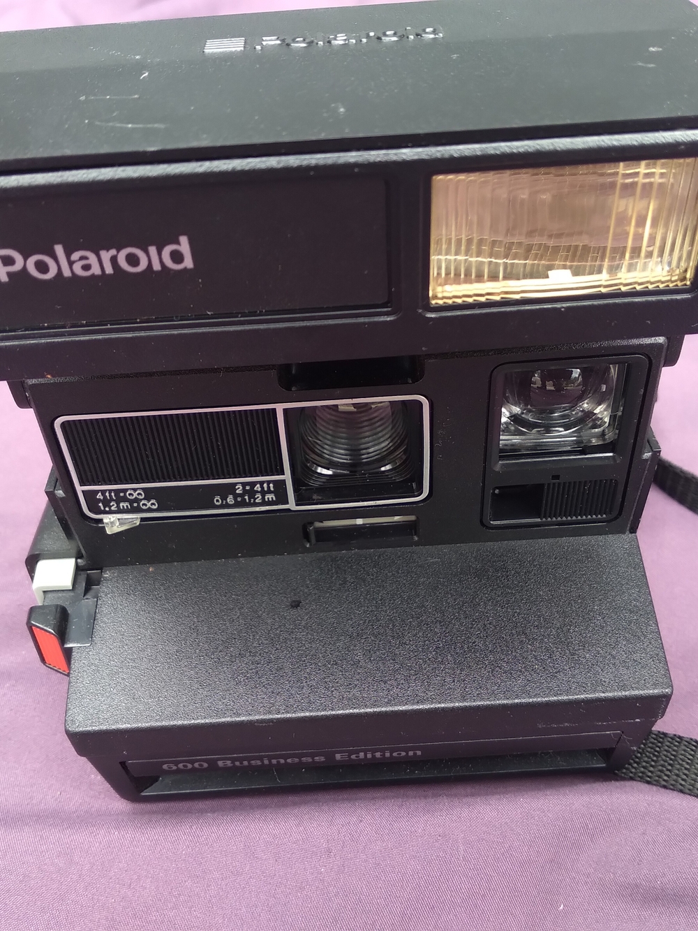 Polaroid Black Instant Camera with Gold Flash Accent